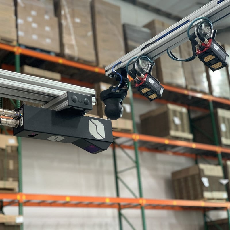 Cubiscan 210-L overhead dimensioning sensor that measures boxes in high-speed and high-volume shipping operations. It's placed over conveyor to dimension parcels as they pass underneath the sensor